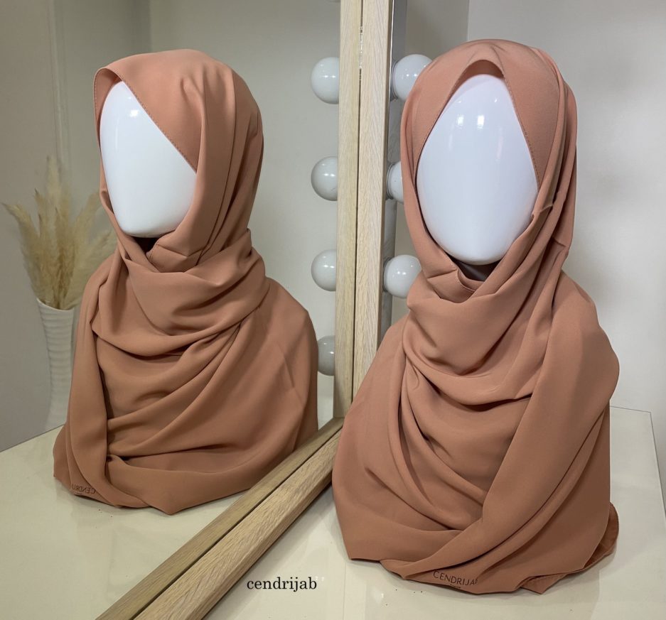 Vente en gros et au détail de hijab en soie de médine, de couleurs orange pastel de bonne qualité, Cendrijab est situé dans le nord de la France et propose une livraison rapide. Cendrijab est grossiste/fournisseur de voile